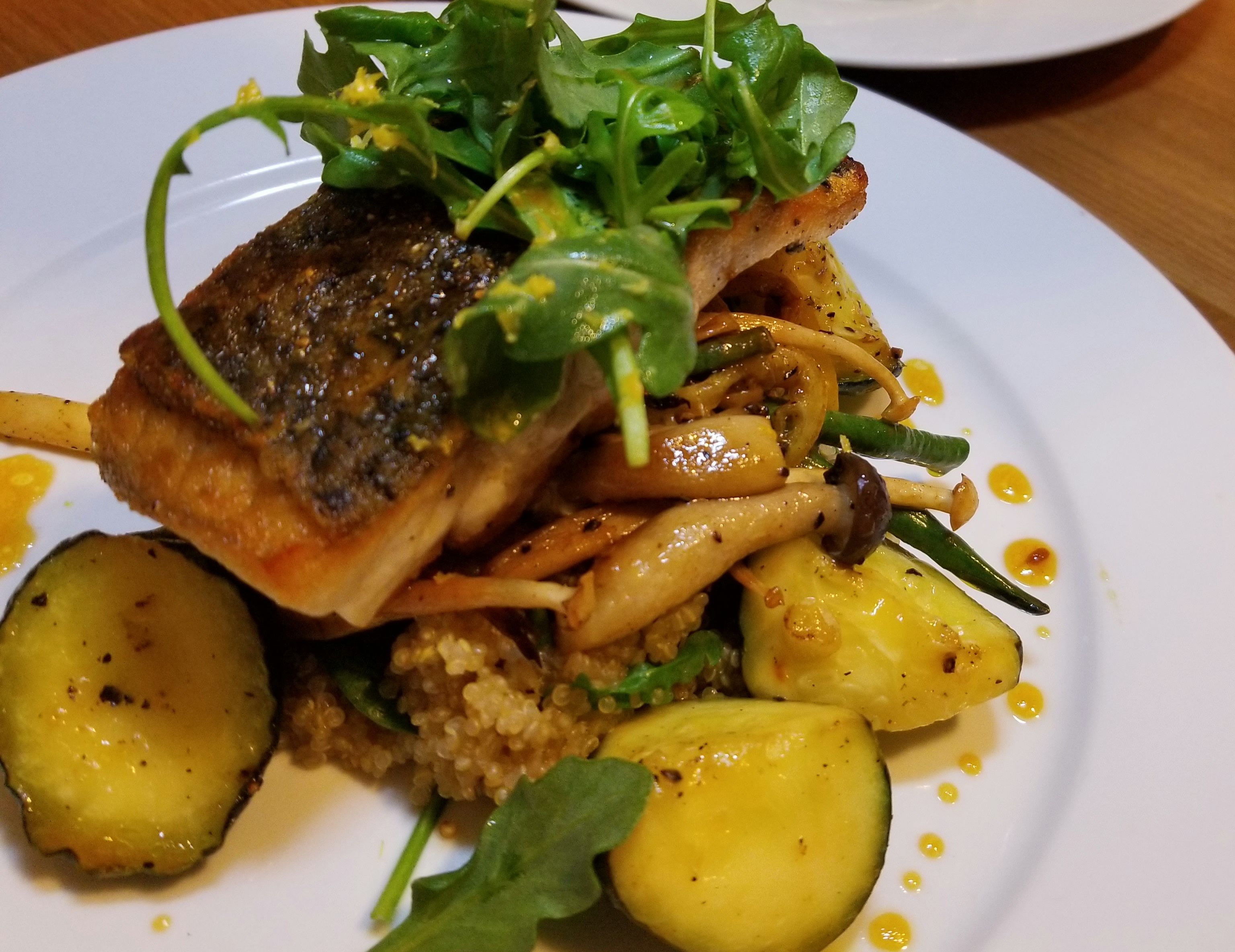 arctic char with summer vegetables over quinoa