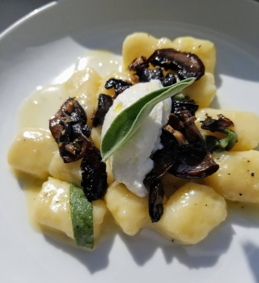 gnocchi with sage butter and cremini with a dollop of lemon ricotta