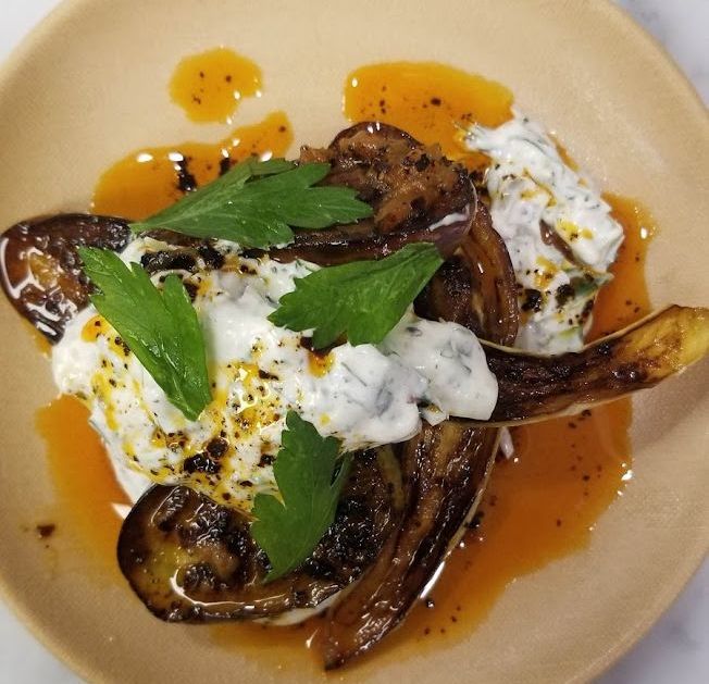 fairytale eggplant with sumac labneh and black urfa chili oil